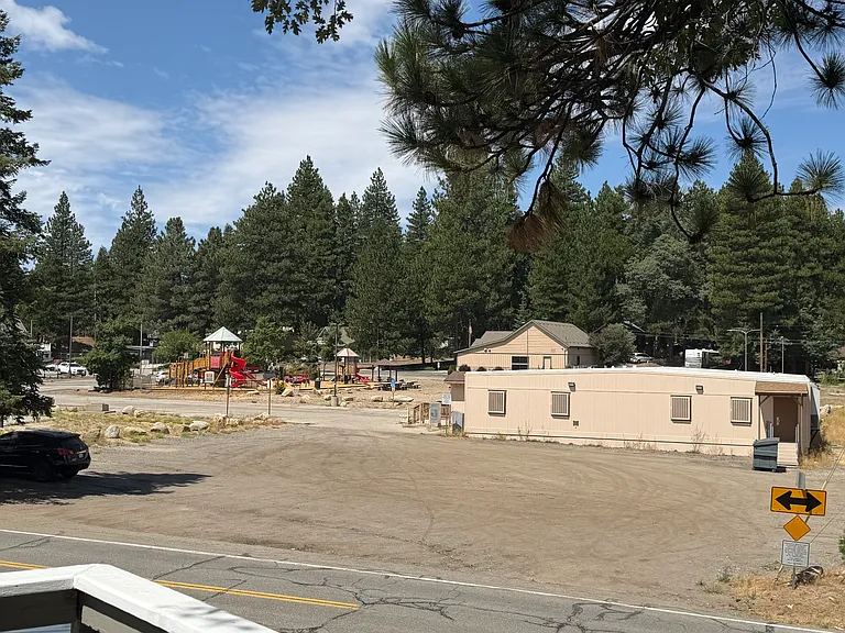 Walking distance to library, park and post office. View from front porch.