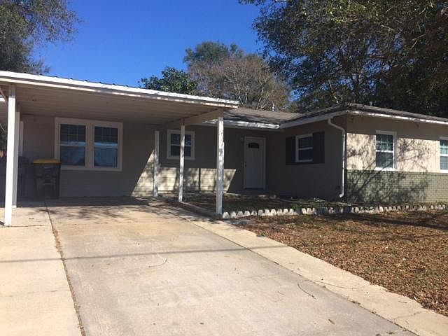 front of home , covered parking for one car, more parking on left of where pic is taken