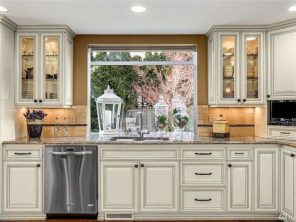 Enjoy views of the private backyard from the large picture window.