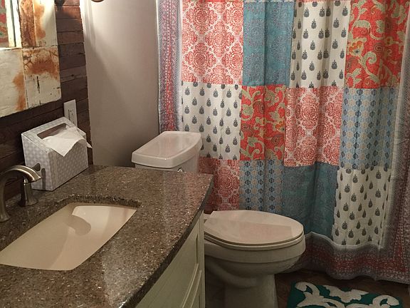 two vanities and barnwood