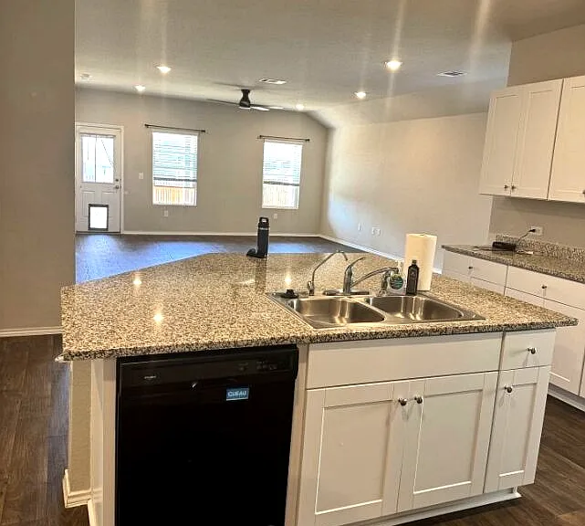 Spacious layout connects seamlessly to kitchen and dining area.