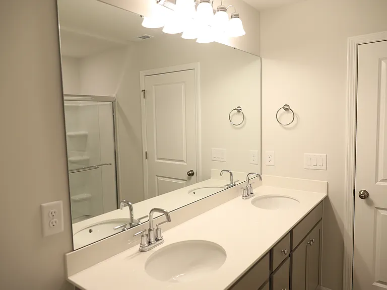 Master Bedroom attached bathroom with double vanity