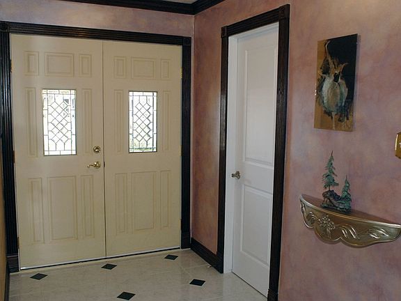 Lead Glass Front Doors & Tile Foyer