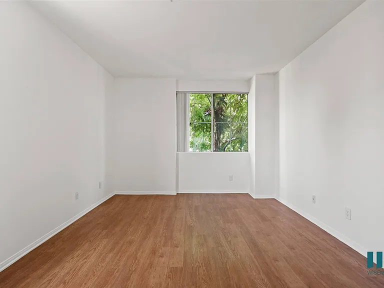 Bedroom with Window and Vinyl Flooring
