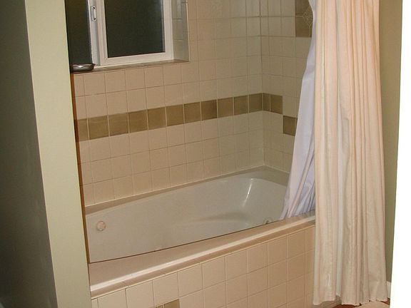 bathroom with jet tub