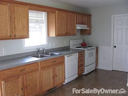 Kitchen
						:
						Porcelain tile in the kitchen with plenty of cabinet space. Appliances included