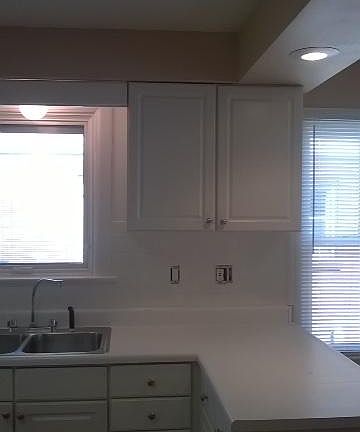 Kitchen with new tiled backsplash