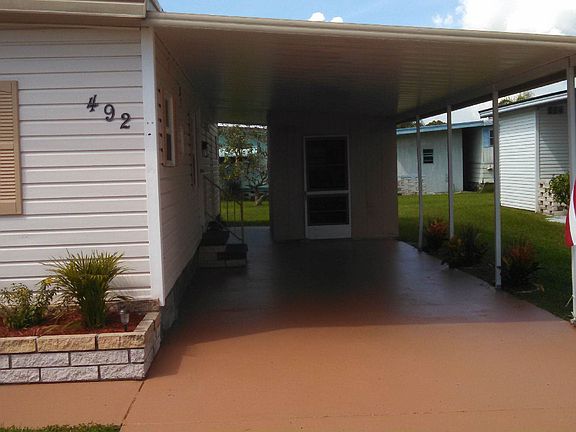 LARGE CARPORT FOR SHADY PARKING