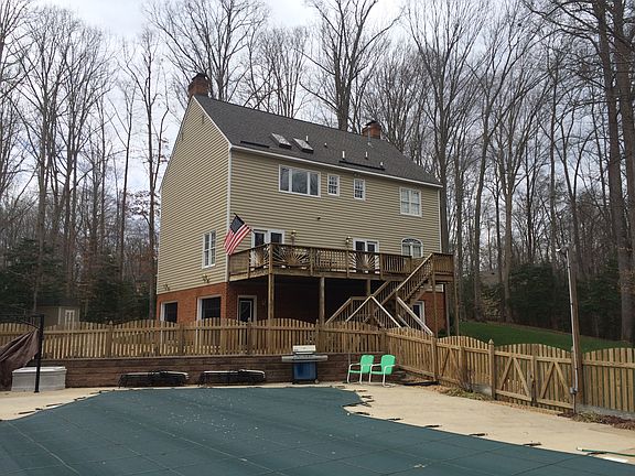 fenced in, in ground pool