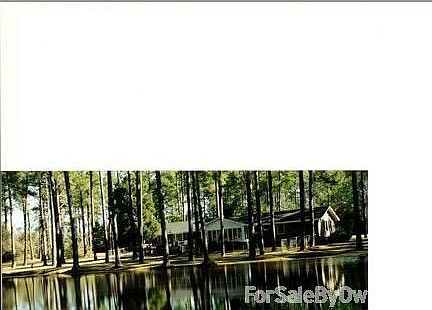 Formal Living Room
						:
						From the living room into the spacious dining room