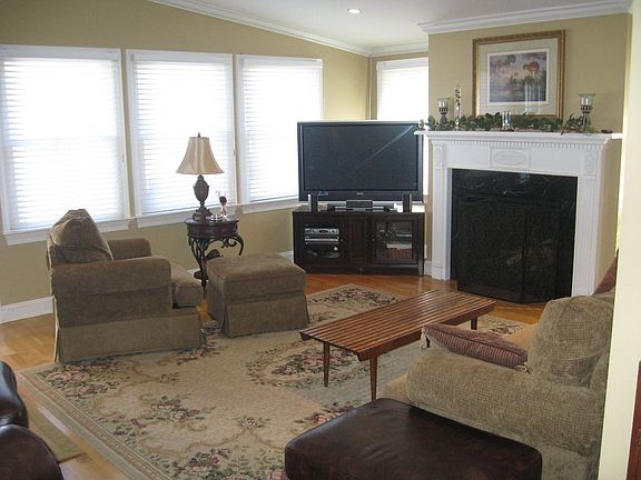 Huge sun-filled great room w/vaulted ceiling