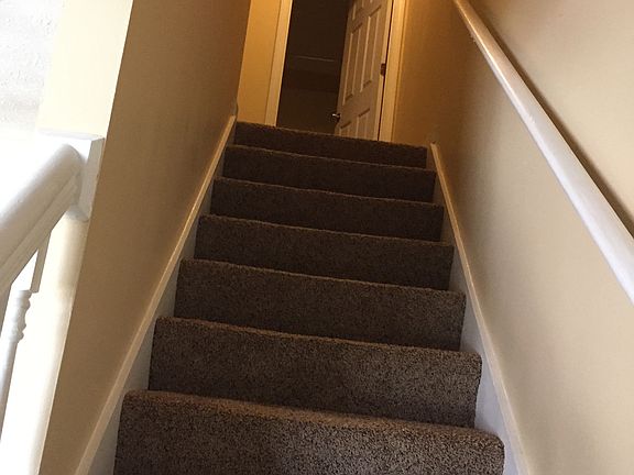stairs to second floor bedroom and bath
