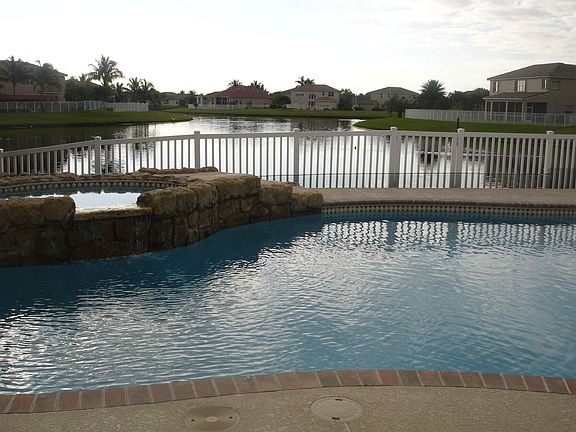 Lake view w/ heated pool and hot tub