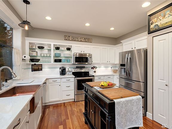 Fabulous kitchen with stainless appliances, custom island.