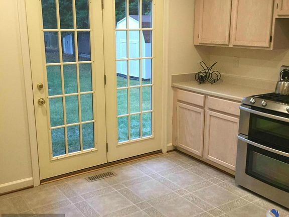 Kitchen double doors leads to outside
