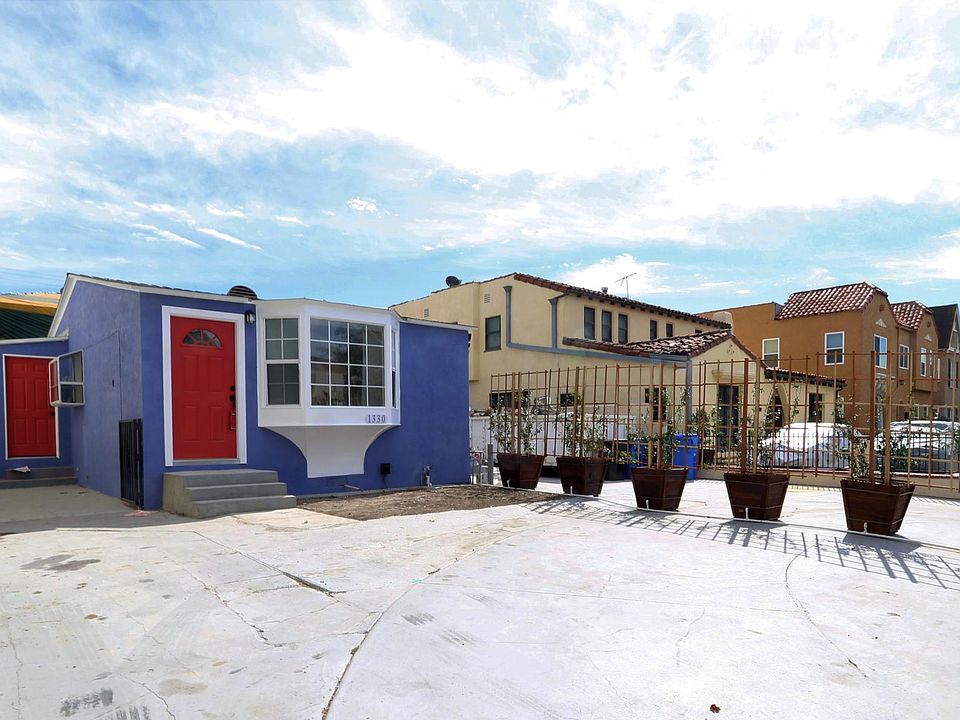 Remote control gated driveway exclusive to the home. See updated photos of white jasmine plants that have fully grown on the trellises.