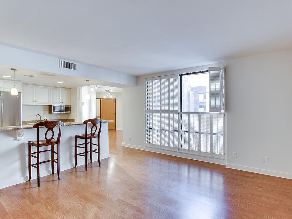 Open concept kitchen/living room with wonderful natural light