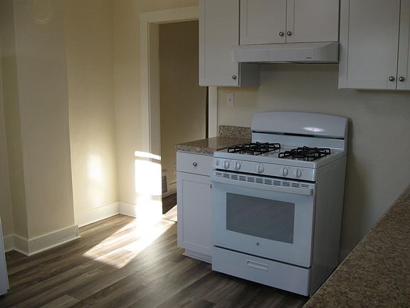 Door leads to living room.