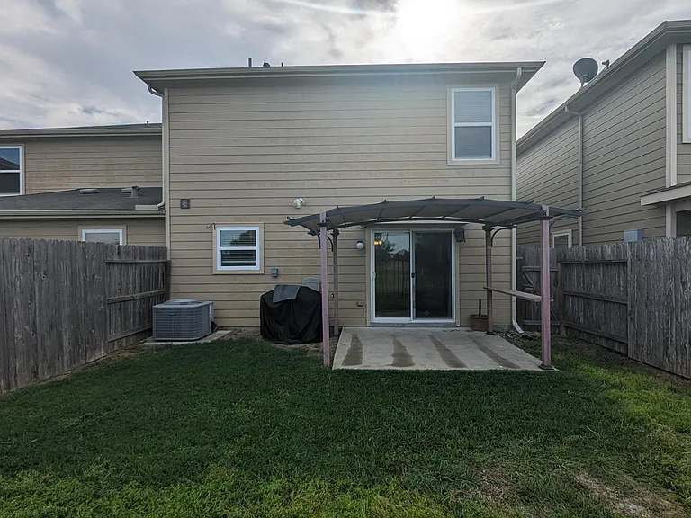 Easily manageable private rear patio with stunning sunsets and access to trails.