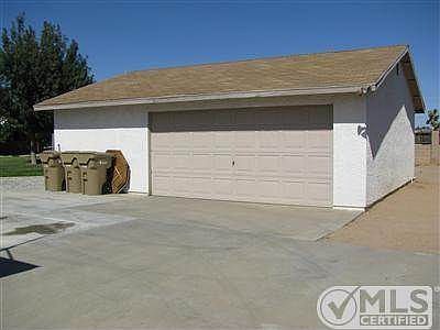 Huge detached garage with workshop area.