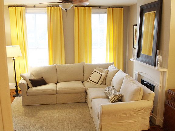 Living room with 9 ft windows