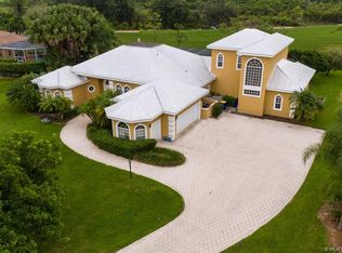 10567 SW Whooping Crane Way, Palm City, FL 34990