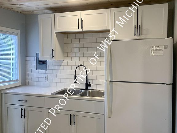 5th image of 13272 Old 14 Mile Rd NE Unit 2