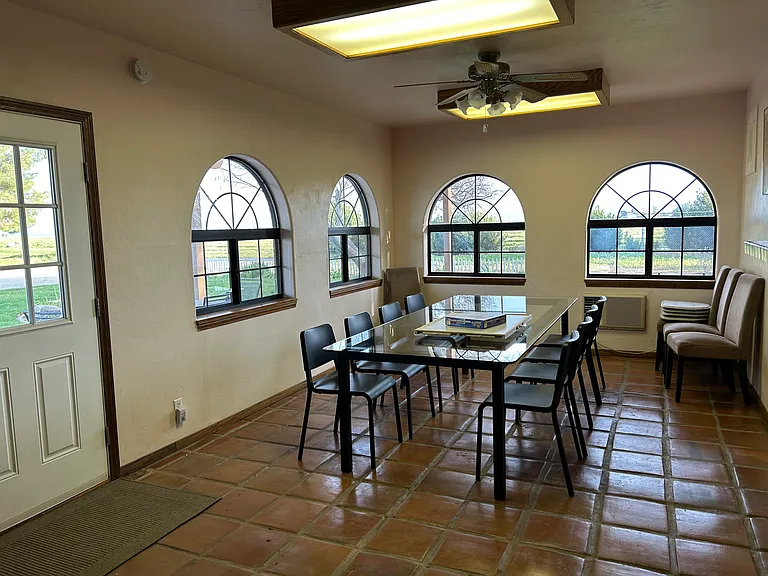 Wow! The enclosed patio has table large enough for 8-10. Need a house for entertaining - this one is for you.