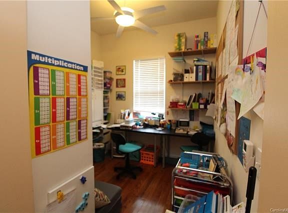 Versatile main floor room near garage for crafts/mudroom/office.