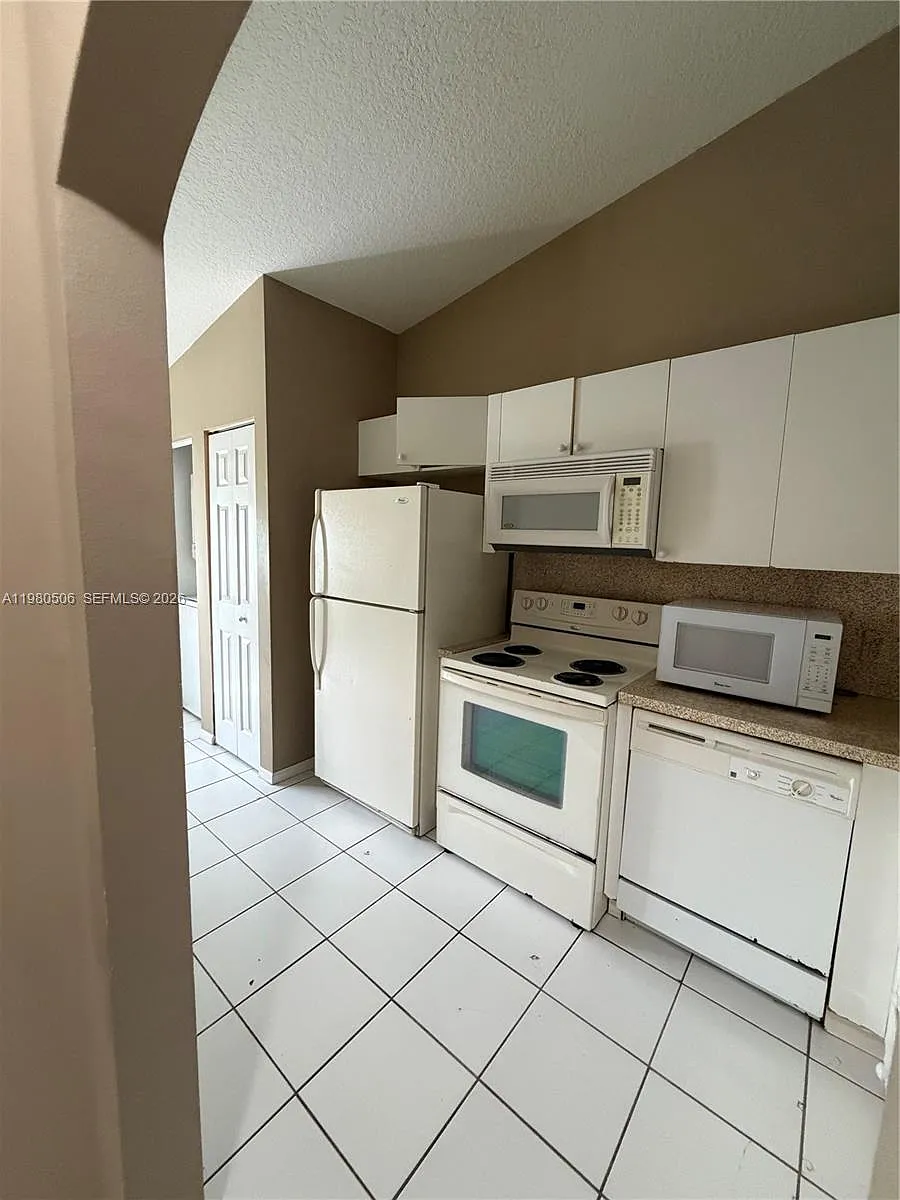 Building Photo - 3780 N Jog Rd #205