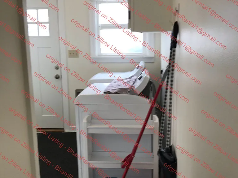 Moving from Laundry room into hallway to Bedrooms & Bathroom.