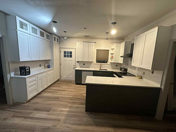 Electrical will be finished and cabinet hardware will be installed.