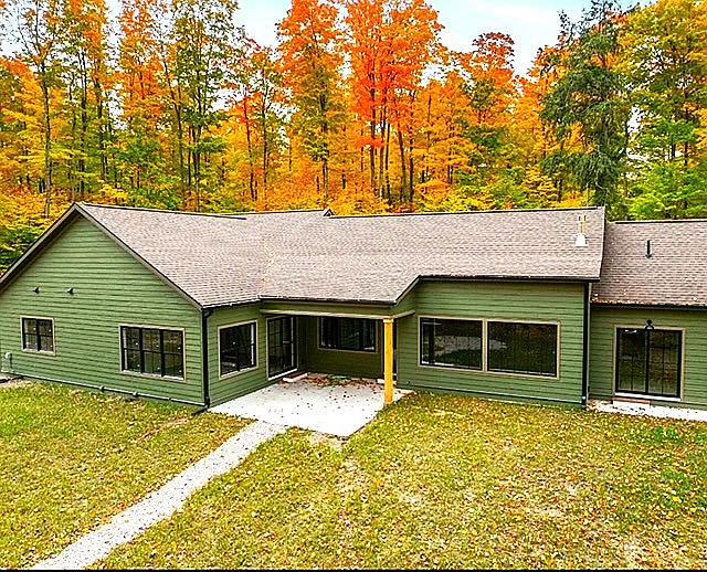 early 2025 with grass before landscaping