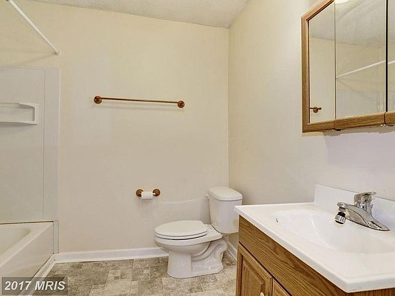 Full Bathroom with Tub/Shower combo and Laundry