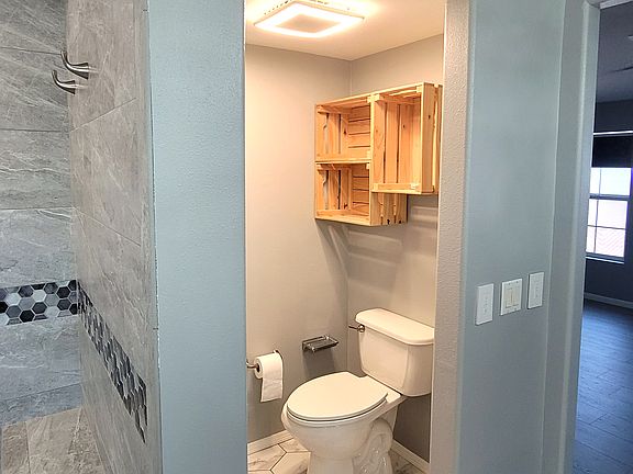 Master Bath Toilet Room & Storage Above