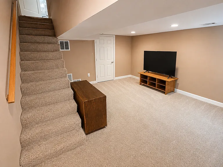 flexible finished basement including full bed optional, wired for cable and DISH, use for rec room, bedroom, storage