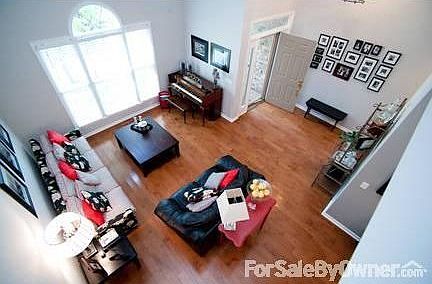 Front Entry
						:
						Open, light, spacious foyer welcomes you and your guests. View from upstairs.