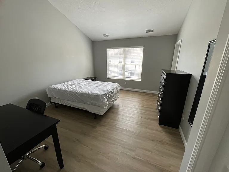 Top floor master bedroom furnished with items shown.