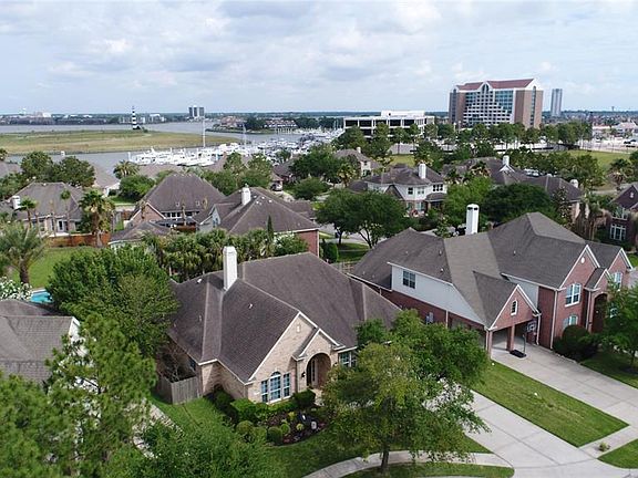 Location, Location, Location! Walk out our Marina Palms Subdivision gate directly to South Shore Harbour Marina and Resort!