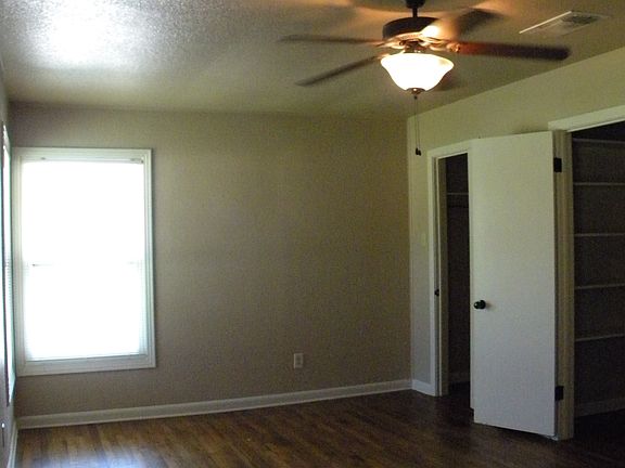 Large secondary bedroom. 18 feet long with 2 closets