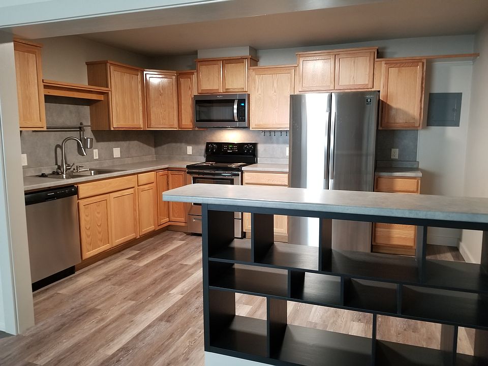 Kitchen from living room. Great cabinet space!