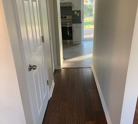 From Foyer to Kitchen and half bath and coat closet