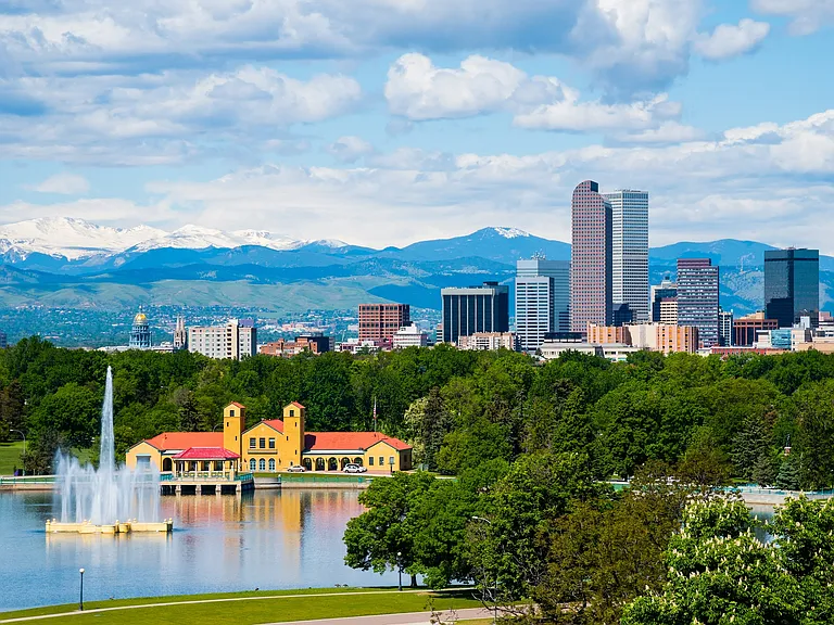 Admire the beauty of Denver, with the majestic mountains providing a breathtaking backdrop.