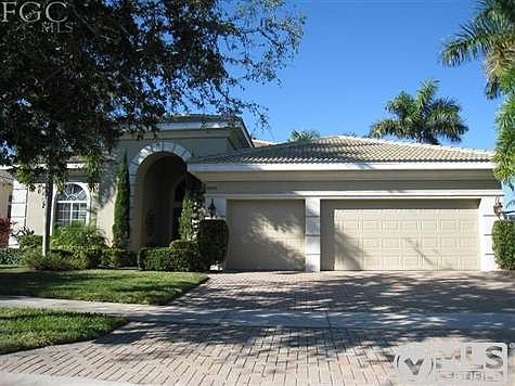 Quality throughout with paver driveway, tile roof, CBS construction and lush, manicured landscaping.