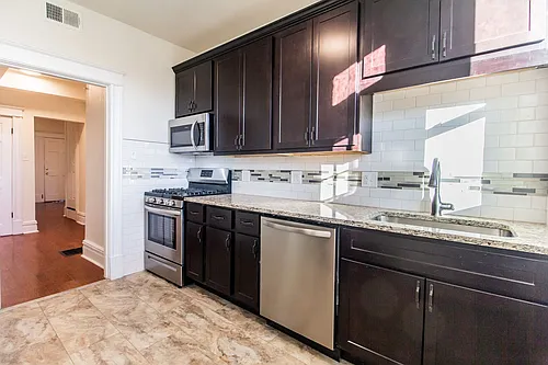 6016 Waterman Blvd #1E Photo 1