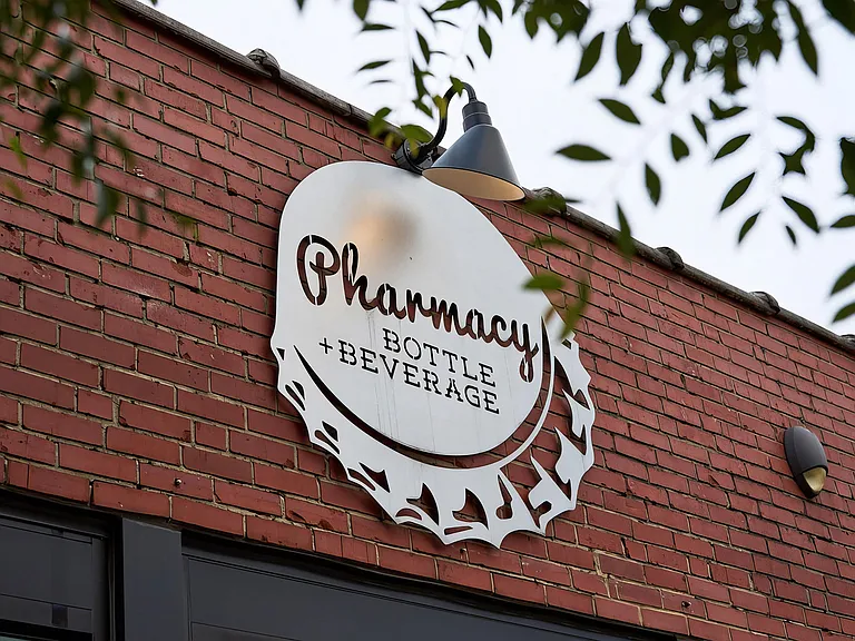 Stop by the local Pharmacy Bottle + Beverage for a drink