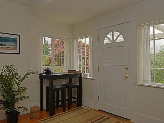 a welcoming foyer with remarkable natural light...