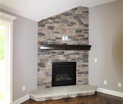 Floor to Ceiling Stone Firepalce- Gas Logs