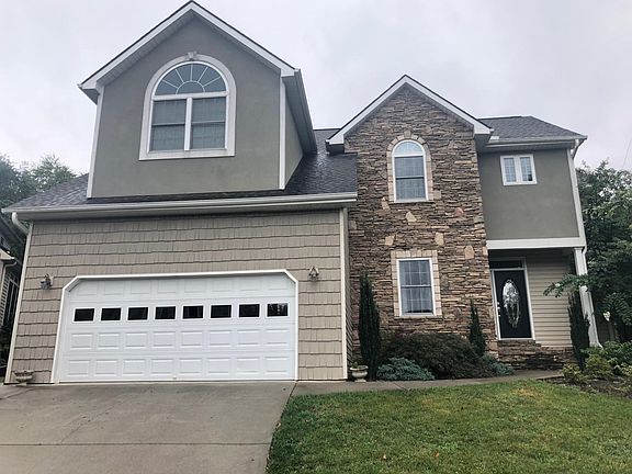 Front view of house with double garage