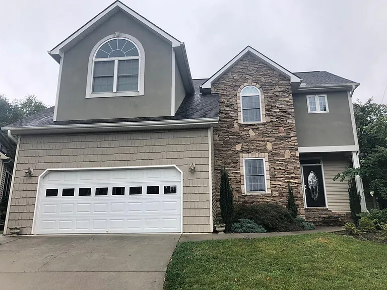 Front view of house with double garage